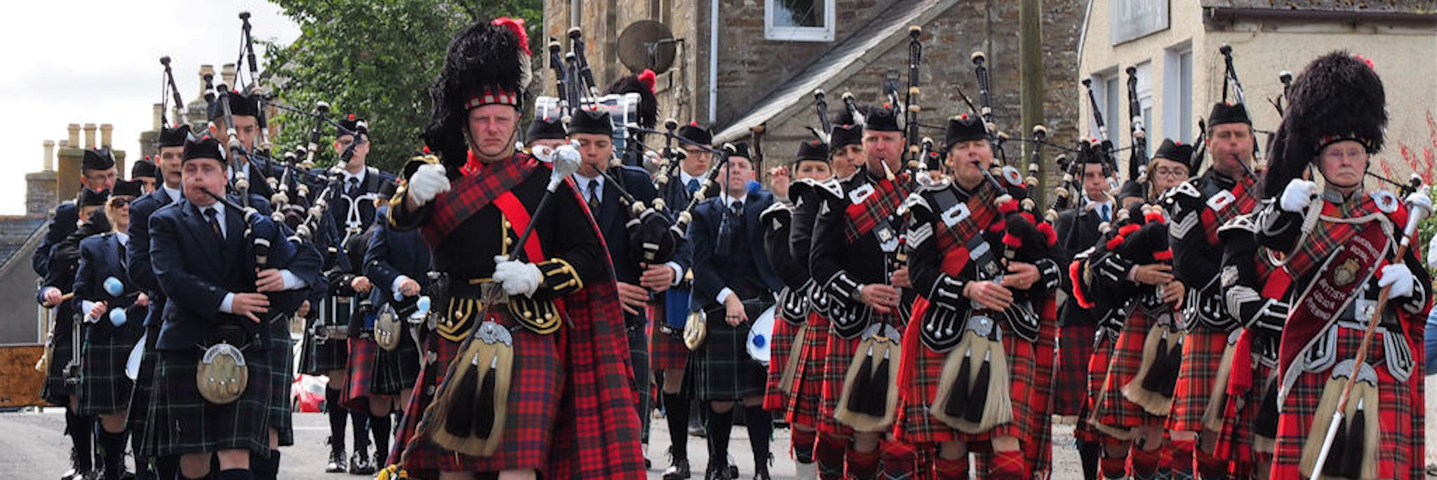 Marching pipe band in Scotland